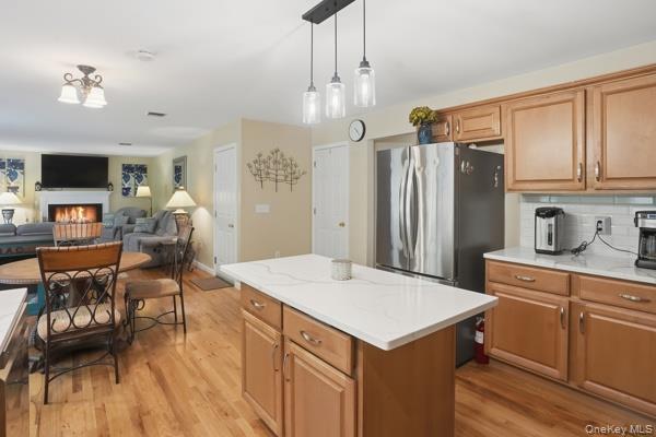 29 Hickory Hill Road Newburgh, NY 12550 - Photo 19 of 47 a kitchen that has a table chairs and wooden floor