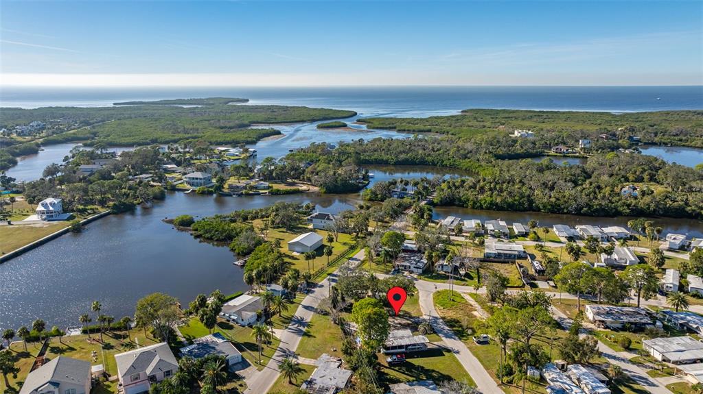 4836 Snug Harbor Road New Port Richey, FL 34652 - Photo 2 of 16 an aerial view of a city