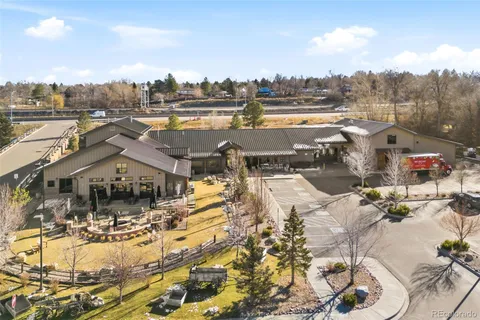 a view of a house with roof deck and sitting area