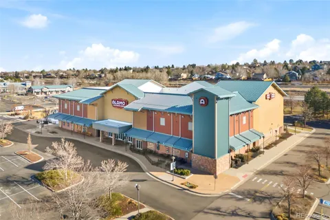 a view of a city with lawn chairs