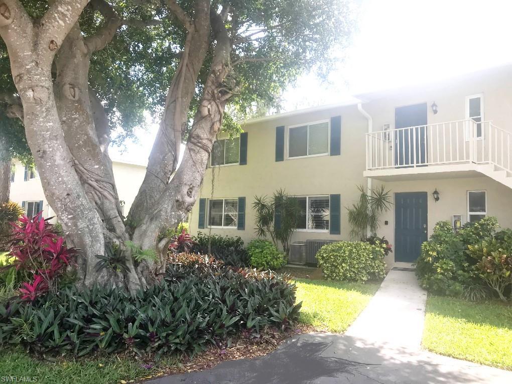 231 Memory Lane, Unit 4 Naples, FL 34112 - Photo 2 of 33 Gorgeous landscaping!