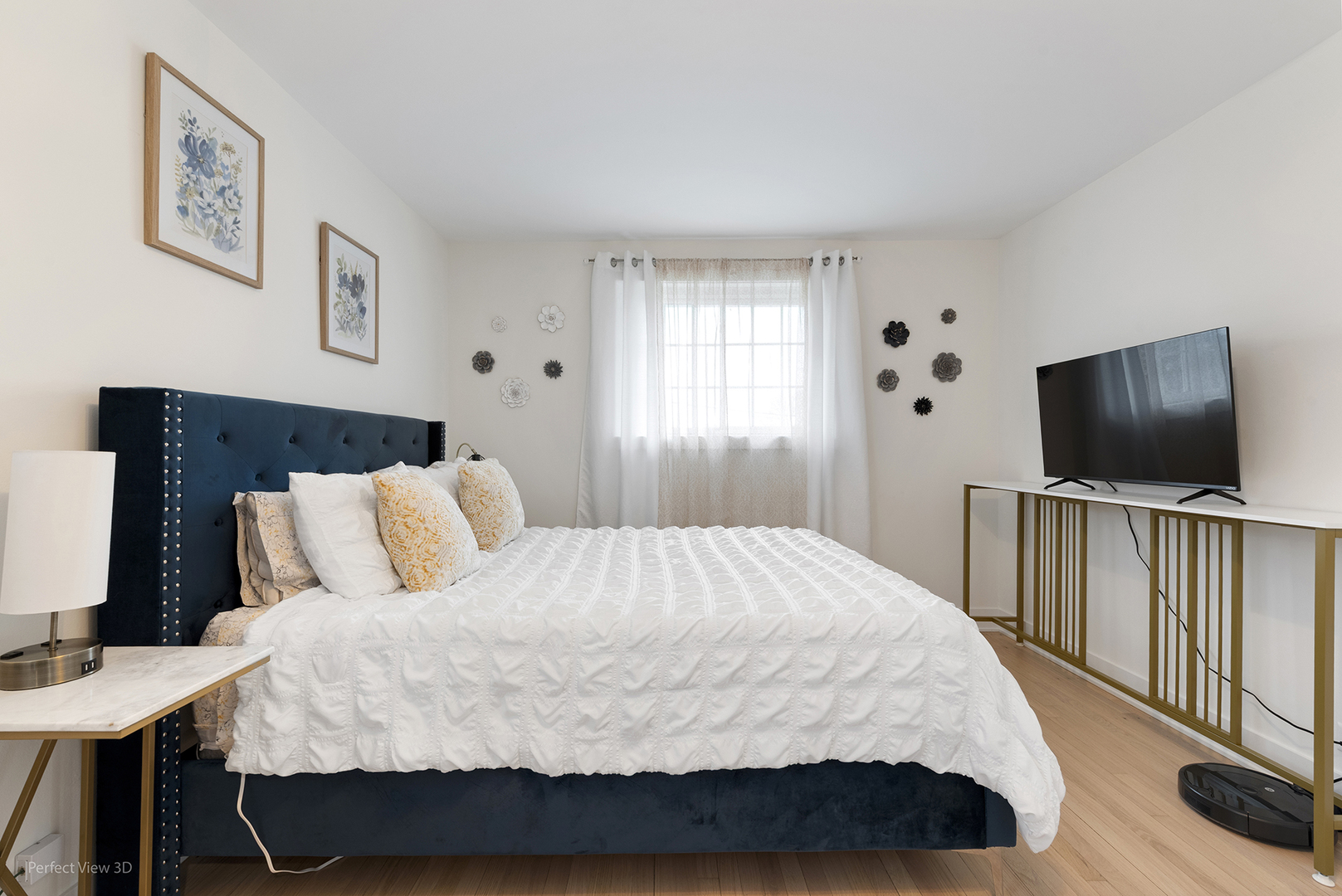 128 South Villa Avenue Addison, IL 60101 - Photo 12 of 27 a bedroom with a bed and a flat screen tv