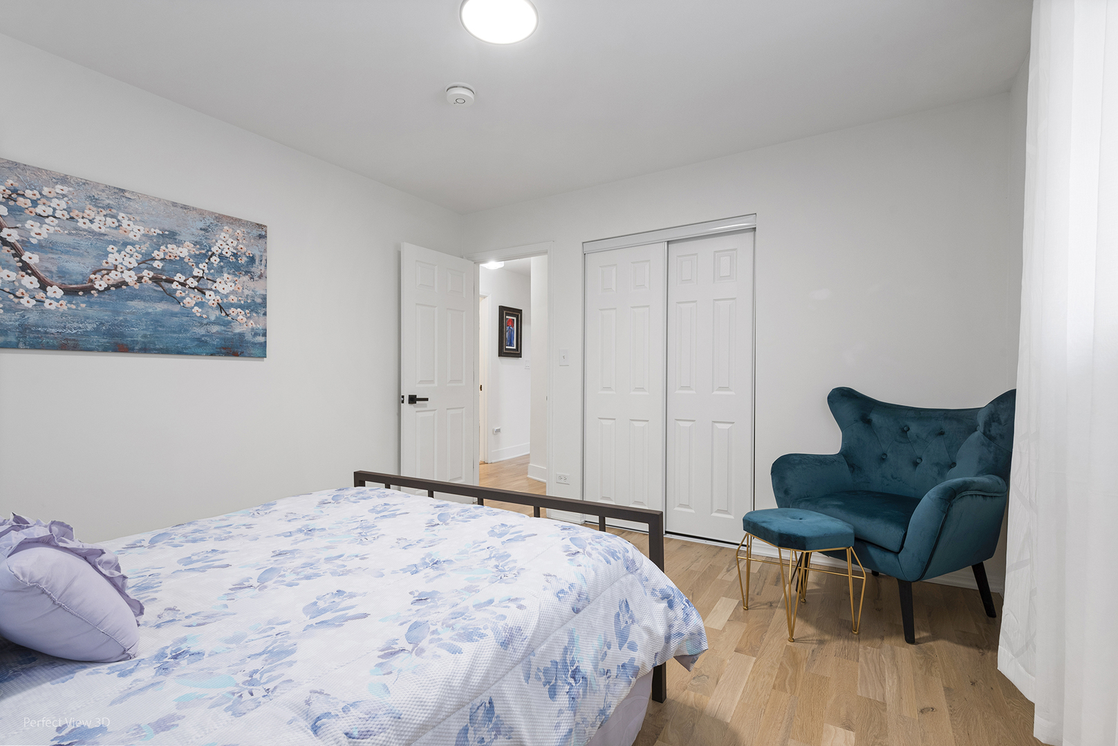 128 South Villa Avenue Addison, IL 60101 - Photo 19 of 27 a bedroom with a bed and a chair