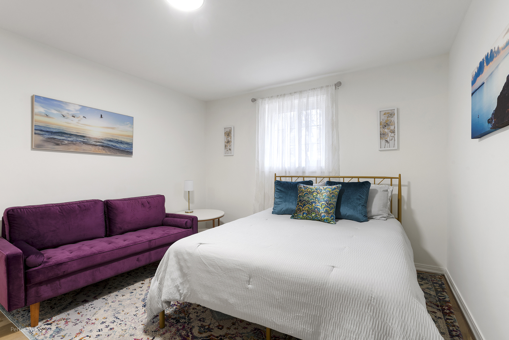 128 South Villa Avenue Addison, IL 60101 - Photo 20 of 27 a bed room with a bed and a couch