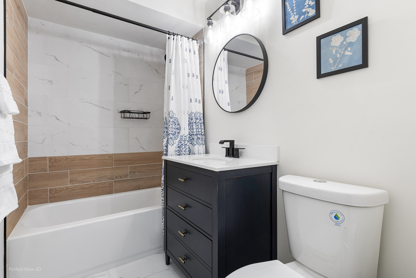 128 South Villa Avenue Addison, IL 60101 - Photo 21 of 27 a bathroom with a sink a mirror a toilet and a bathtub