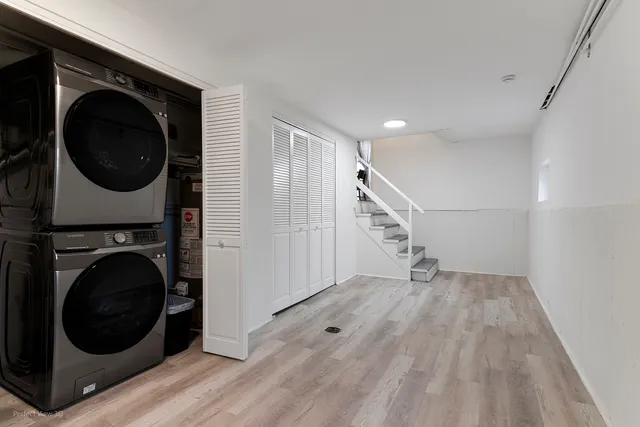 a view of a hallway with washer and dryer