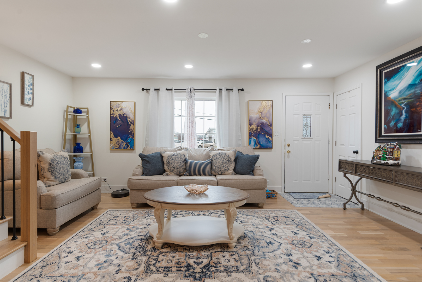 128 South Villa Avenue Addison, IL 60101 - Photo 3 of 27 a living room with furniture and a rug
