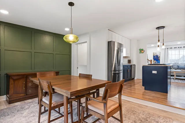 a view of a dining room with furniture