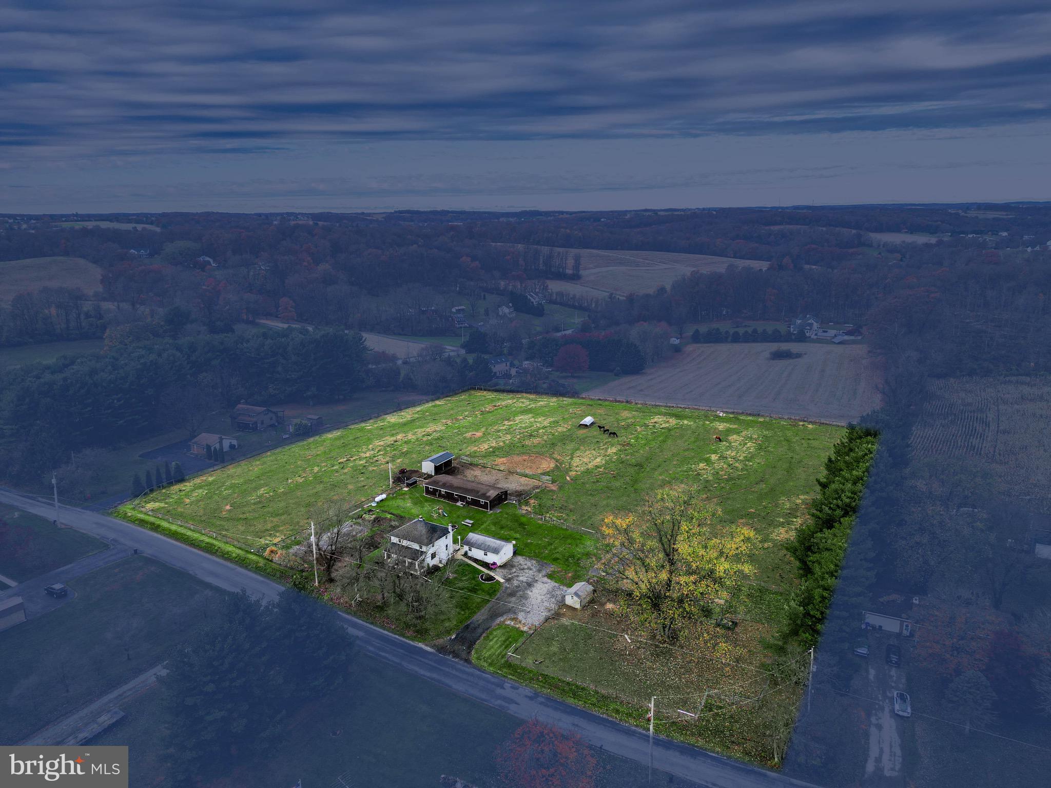 54 Mitchell Road Airville, PA 17302 - Photo 2 of 35 a view of a garden with a pathway