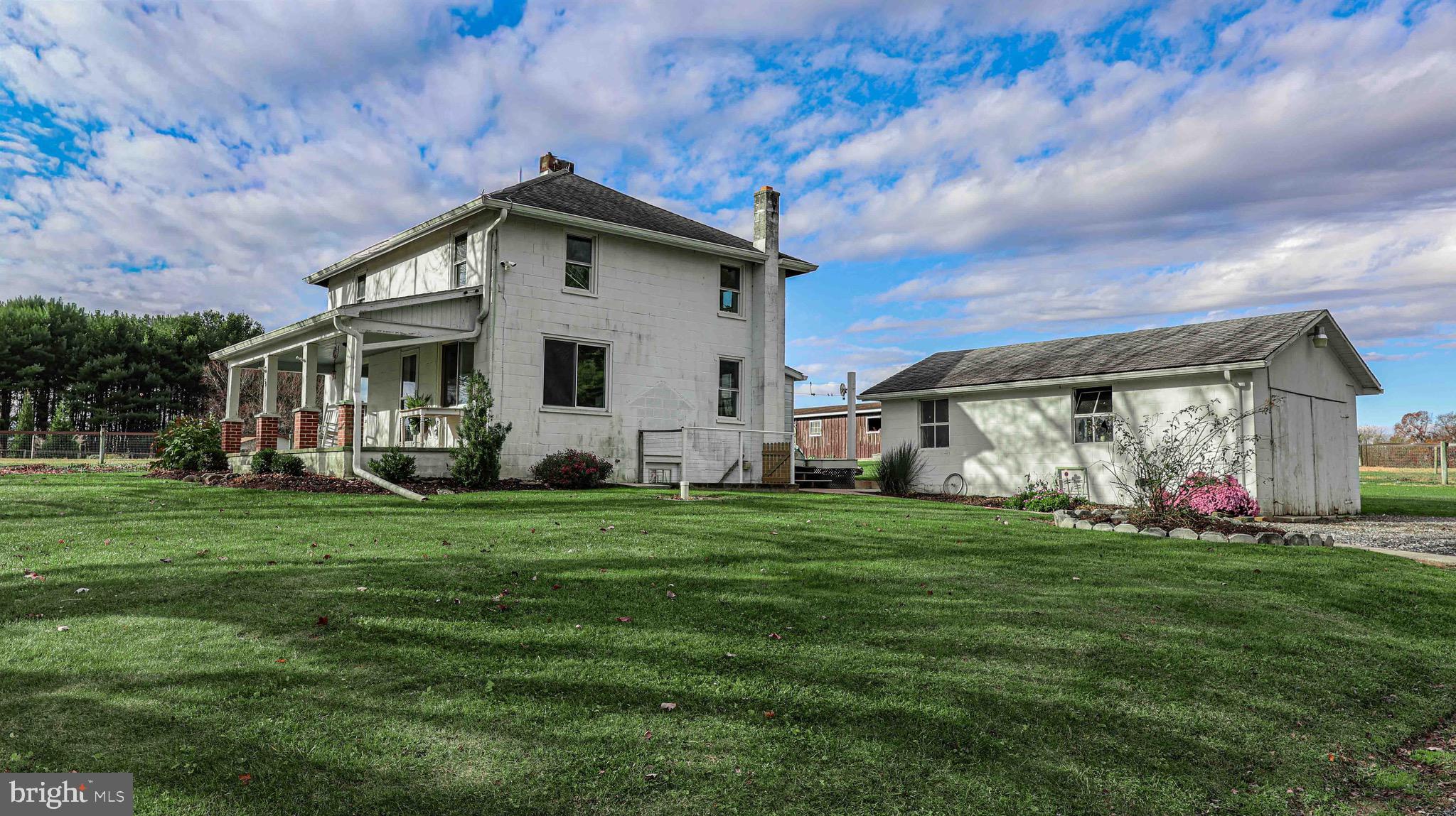 54 Mitchell Road Airville, PA 17302 - Photo 21 of 35 a view of a house with a big yard and sitting area