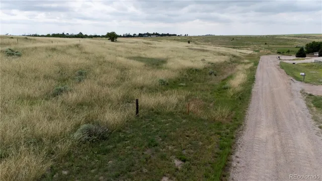 a view of a lake with a big yard