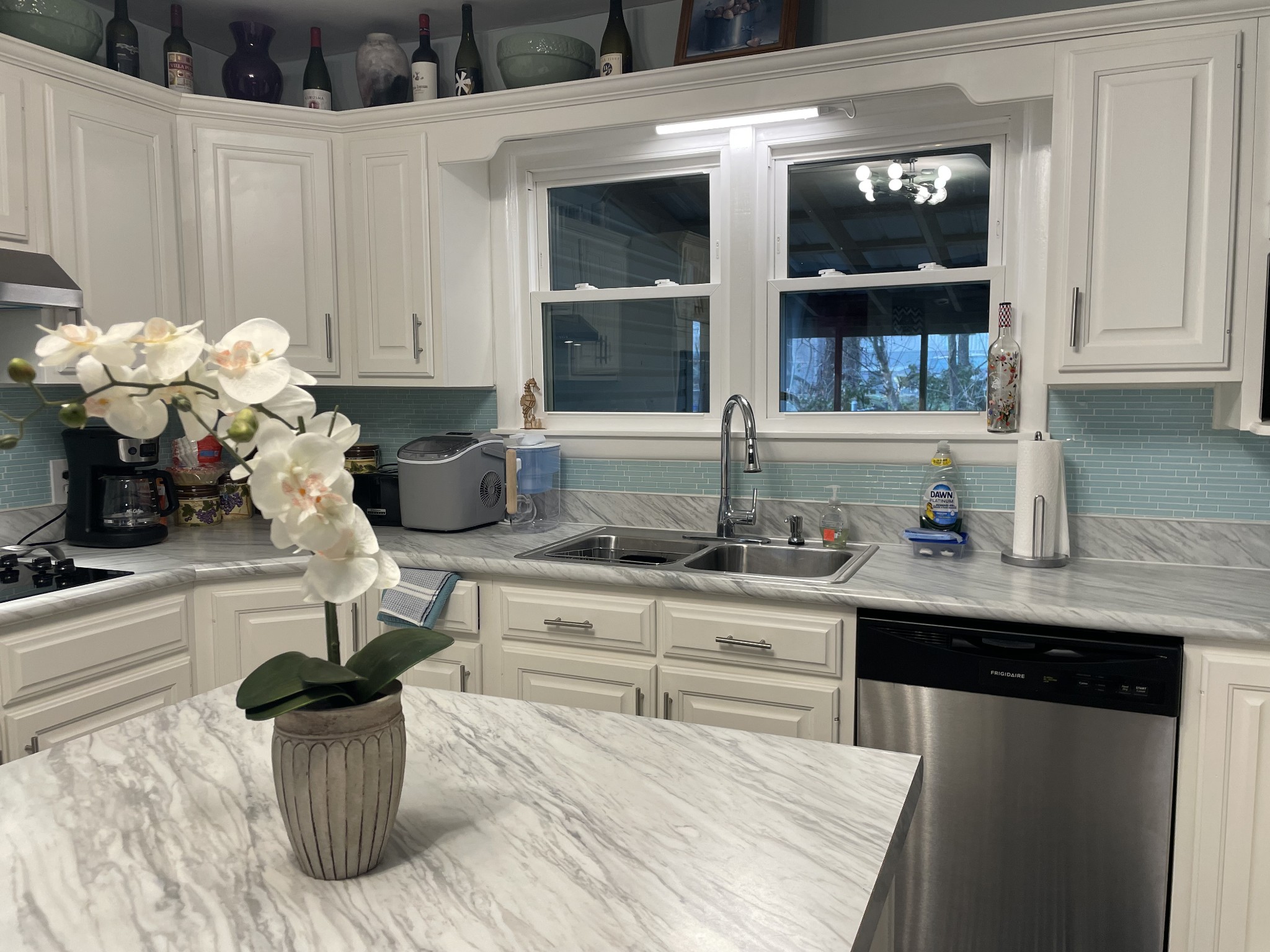 202 Shasteen Street Estill Springs, TN 37330 - Photo 12 of 35 a kitchen with a sink and cabinets
