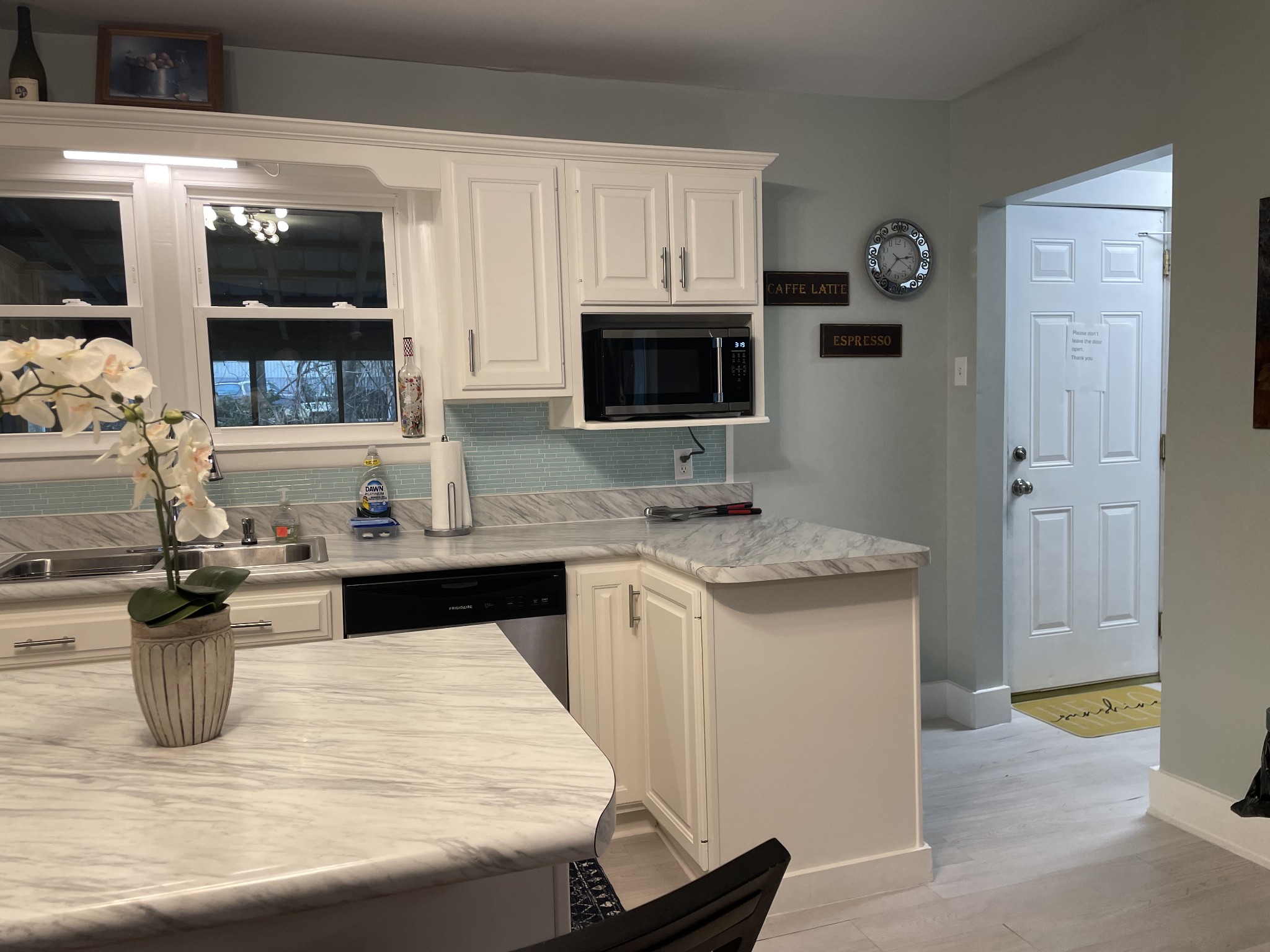 202 Shasteen Street Estill Springs, TN 37330 - Photo 13 of 35 a kitchen with a stove top oven and sink