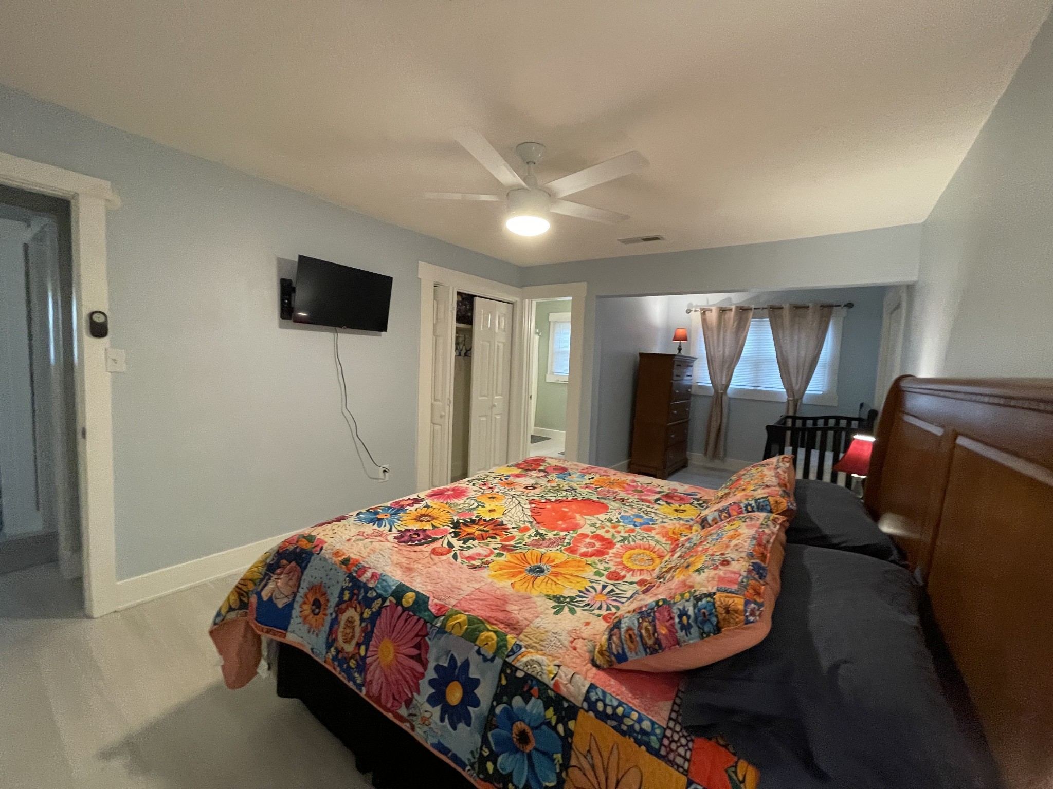 202 Shasteen Street Estill Springs, TN 37330 - Photo 15 of 35 a bedroom with a bed and a television