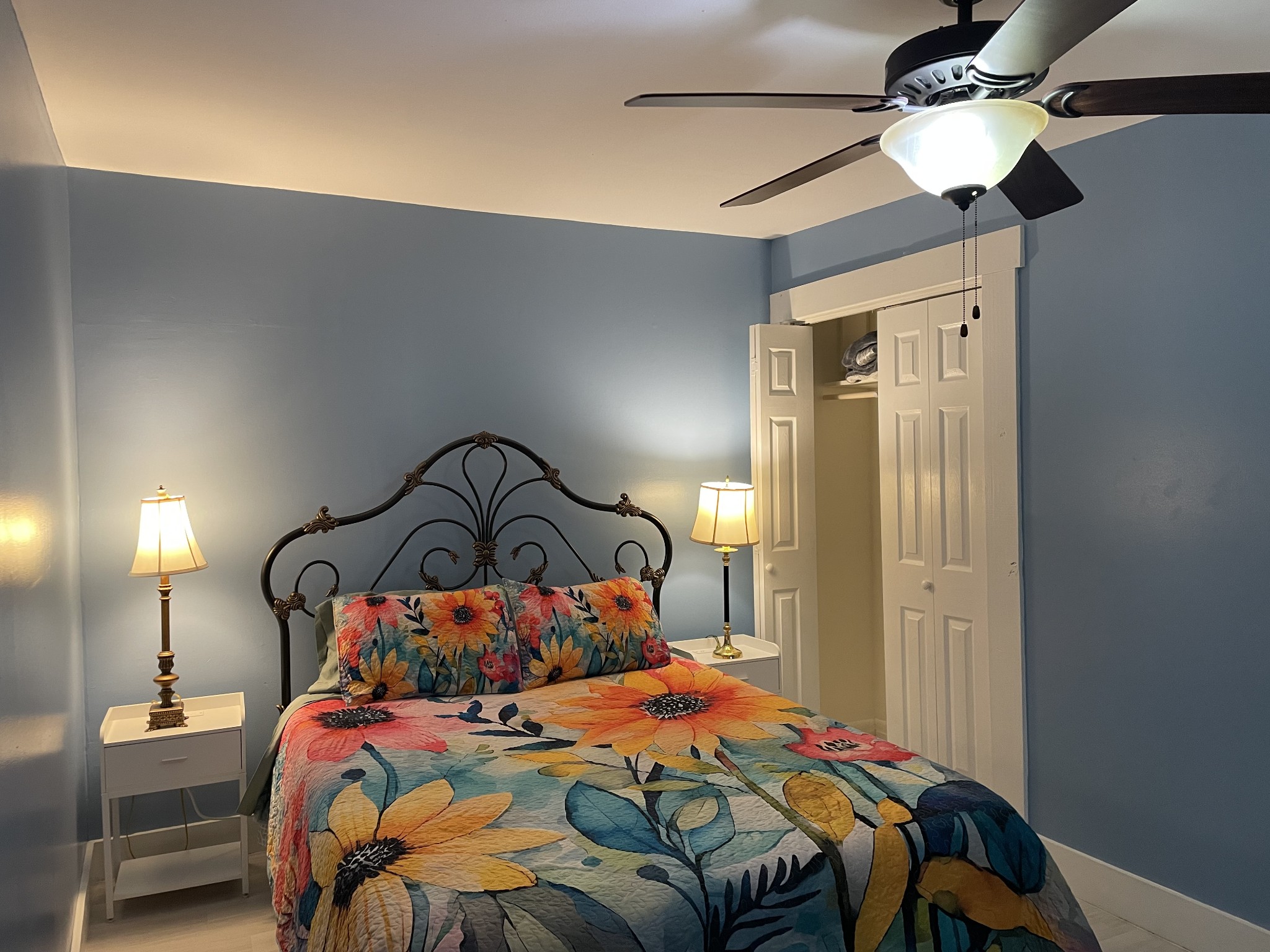 202 Shasteen Street Estill Springs, TN 37330 - Photo 23 of 35 a bedroom with a bed and a ceiling fan