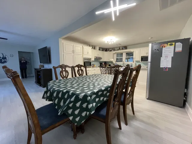 a view of a dining room with furniture