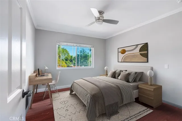 a bedroom with a bed and a table