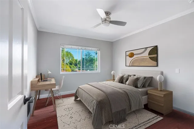 a bedroom with a bed and a table