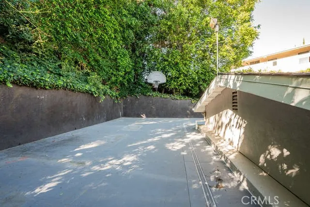 a backyard of a house with lots of green space