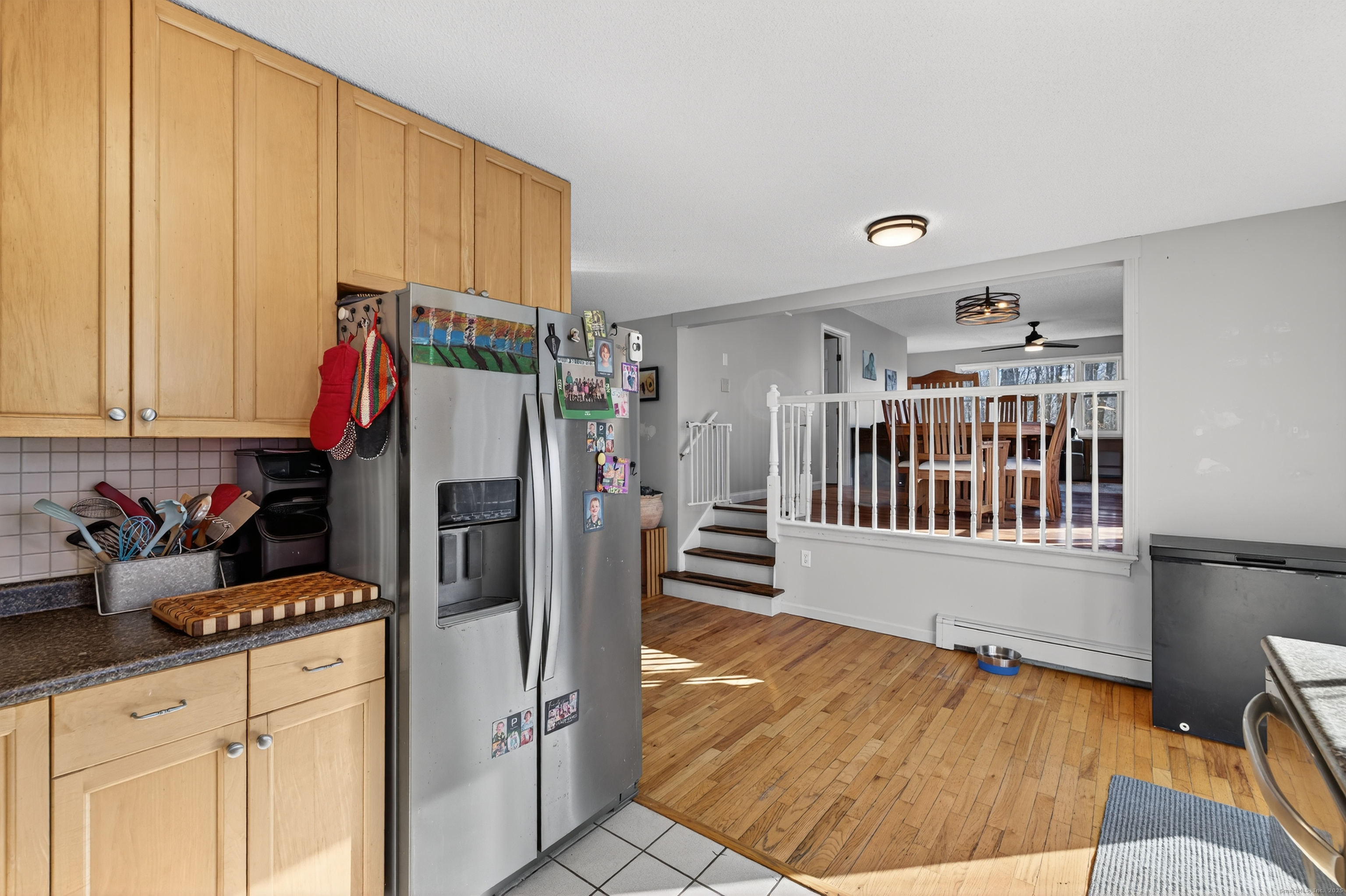 116 Spicer Hill Road Ledyard, CT 06339 - Photo 12 of 29 a kitchen with stainless steel appliances kitchen island granite countertop a refrigerator and a sink