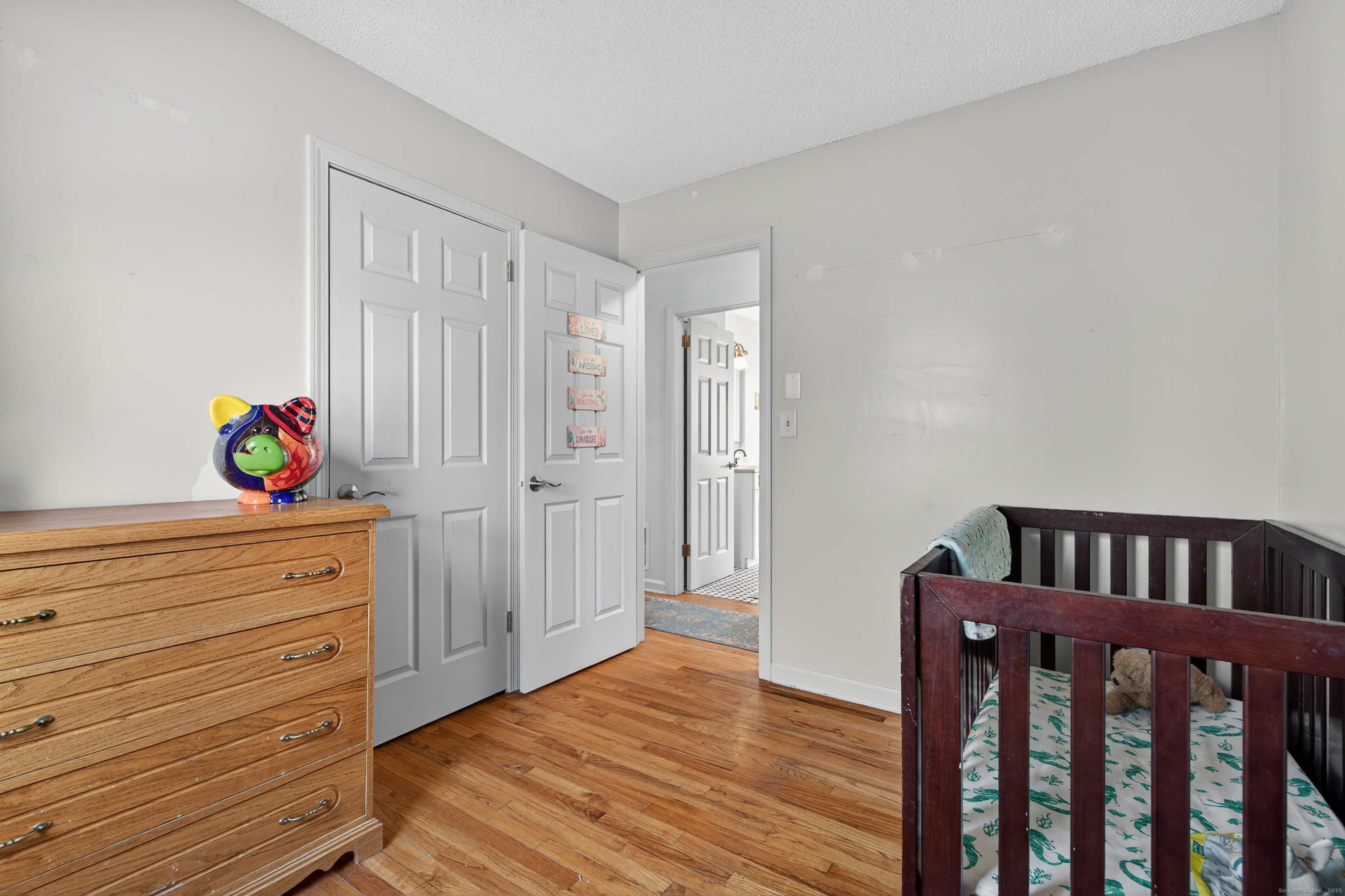 116 Spicer Hill Road Ledyard, CT 06339 - Photo 21 of 29 a bedroom with a bed and a window