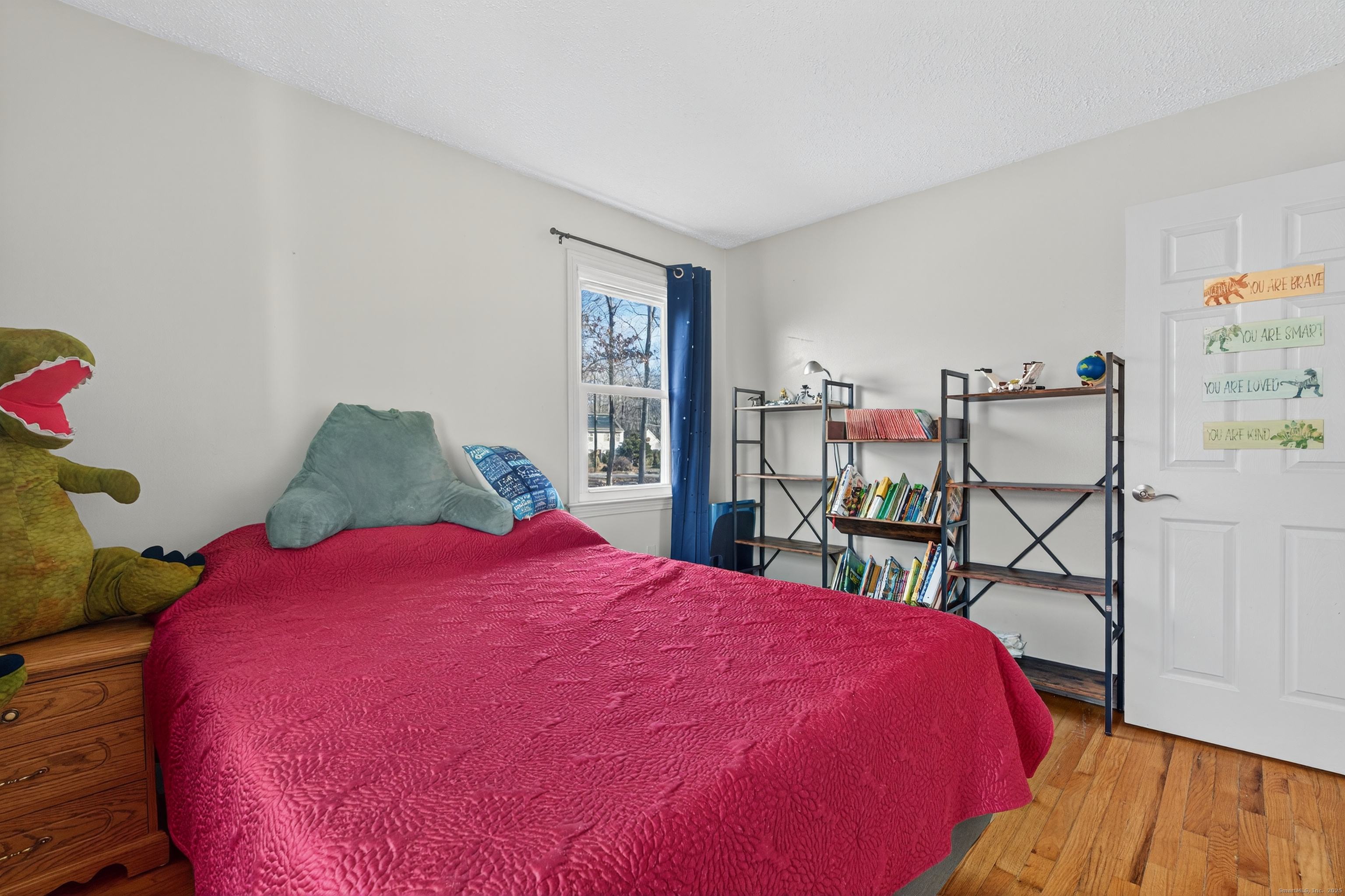 116 Spicer Hill Road Ledyard, CT 06339 - Photo 22 of 29 a bed room with a bed and a couch