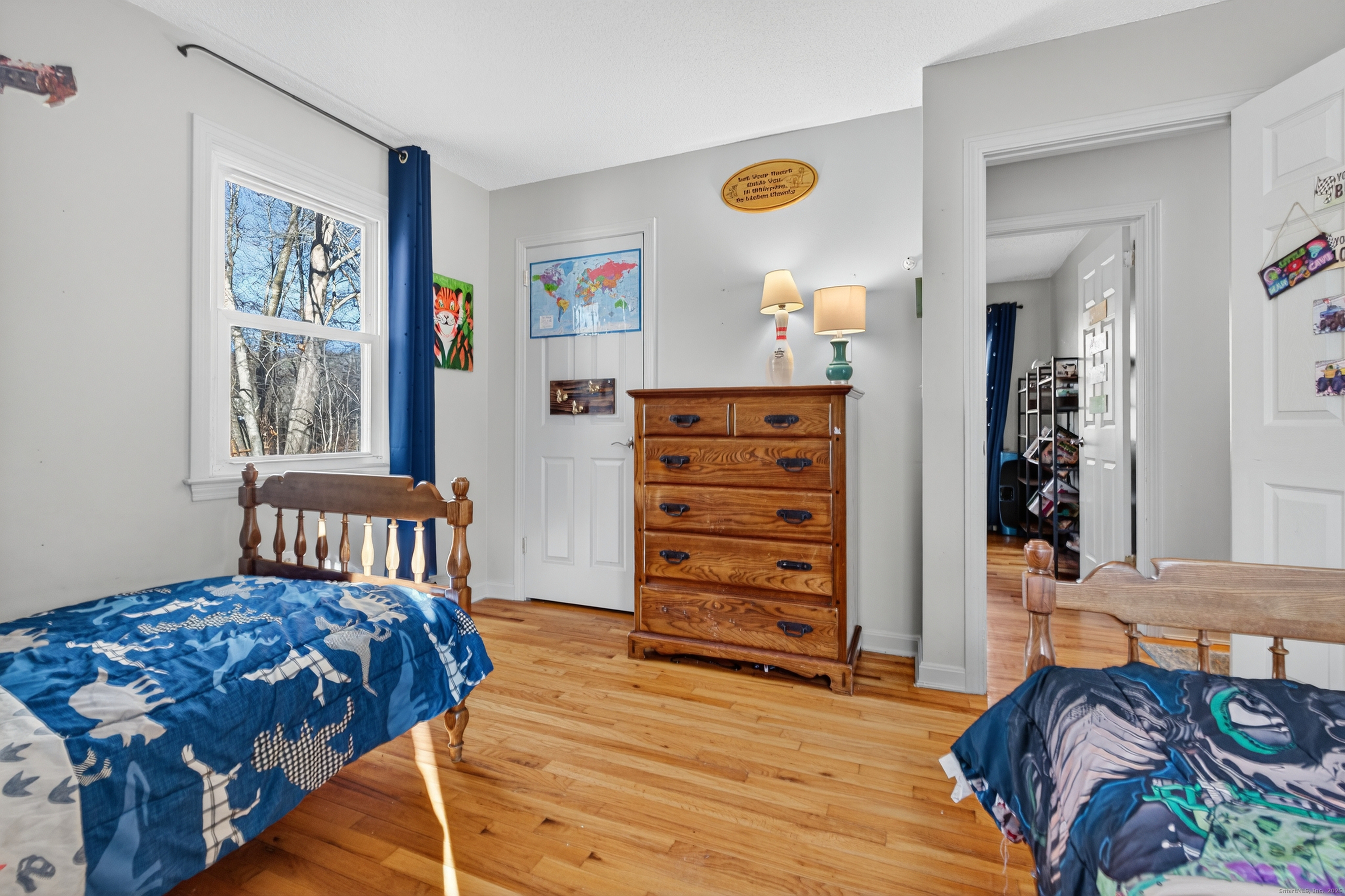 116 Spicer Hill Road Ledyard, CT 06339 - Photo 25 of 29 a bedroom with a bed and a closet