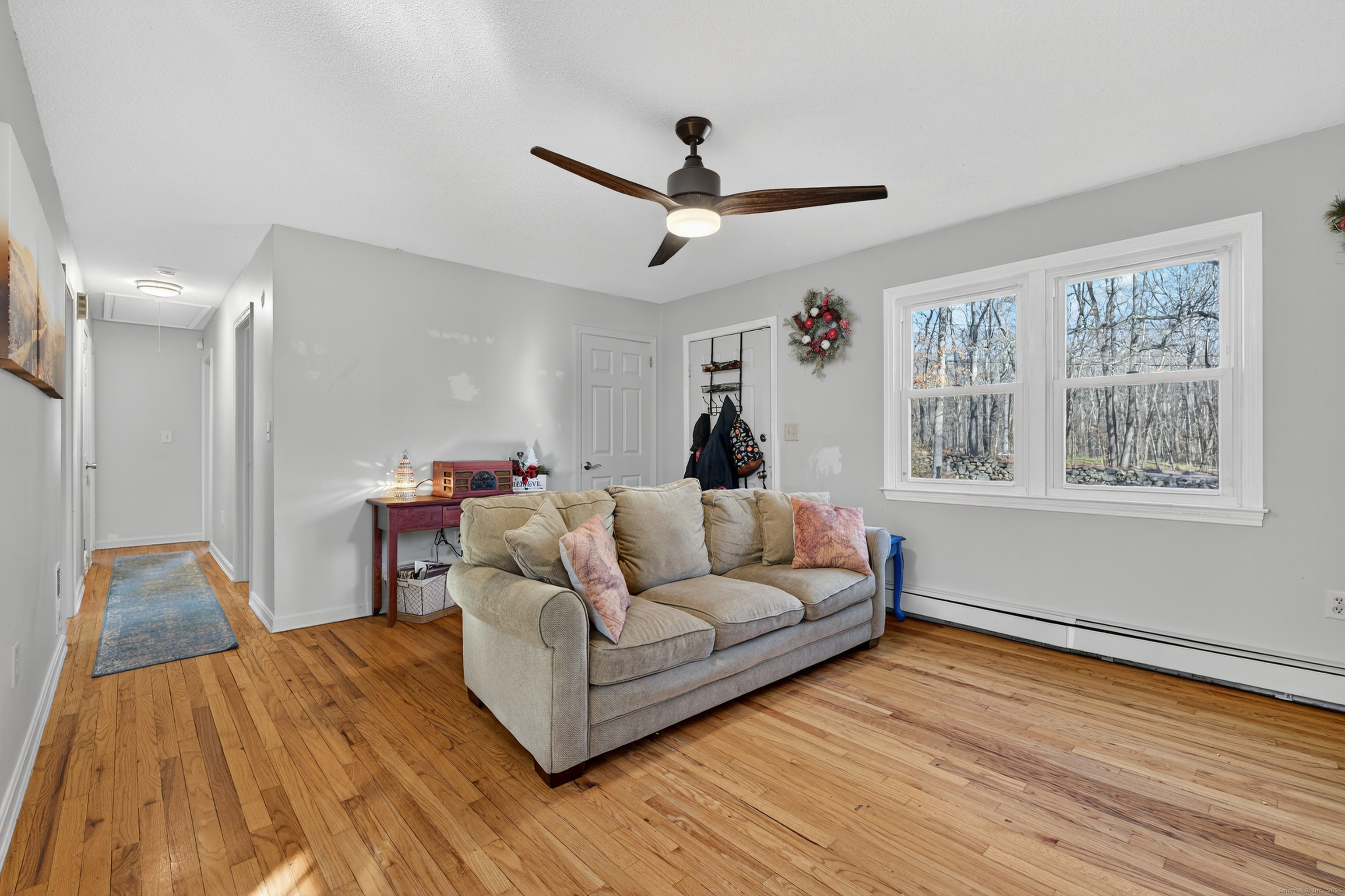 116 Spicer Hill Road Ledyard, CT 06339 - Photo 8 of 29 a living room with furniture and a window