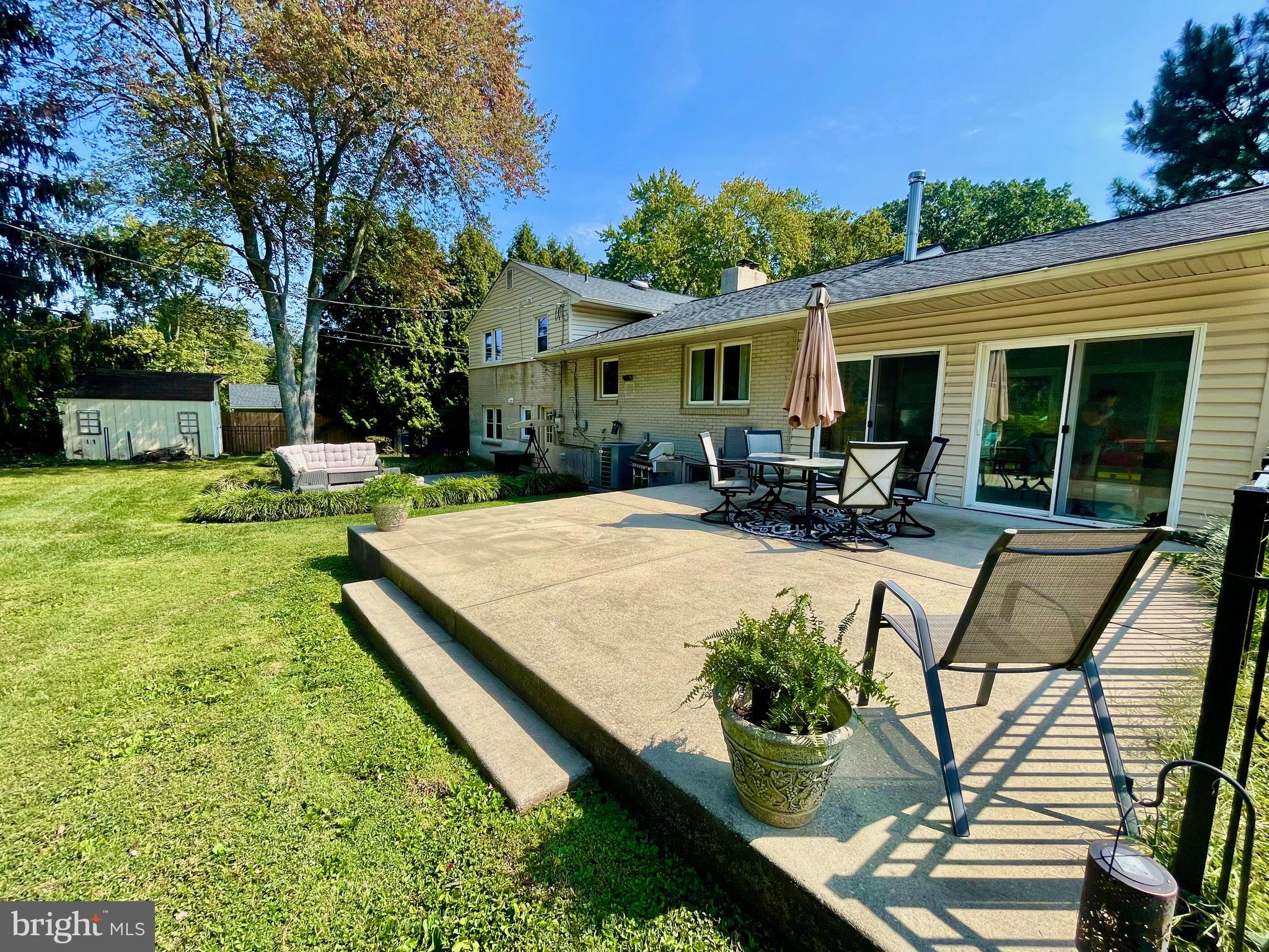 603 Ivydale Road Wilmington, DE 19803 - Photo 5 of 49 expansive cement Patio from the Sunroom