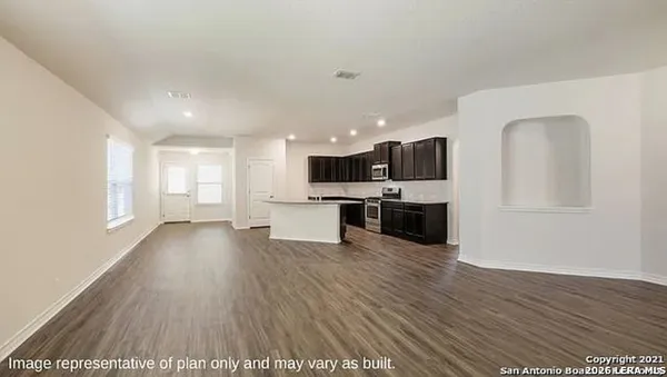a view of kitchen with wooden floor