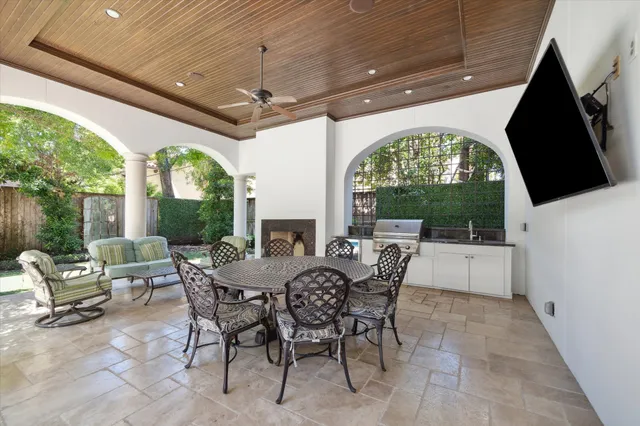a view of an outside dining space with furniture window