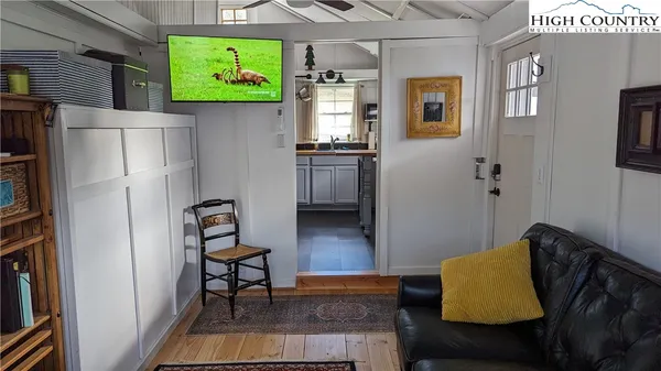 a kitchen with stainless steel appliances granite countertop a refrigerator and a stove