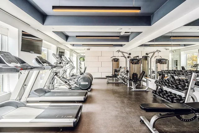 a view of a room with gym equipment