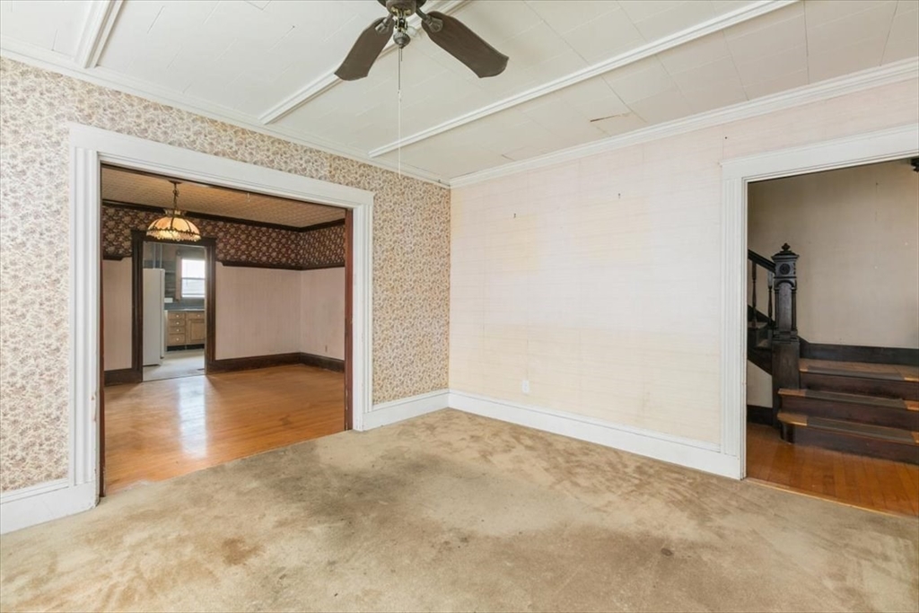 98 Webster Street Haverhill, MA 01830 - Photo 11 of 42 a view of a hallway with a room