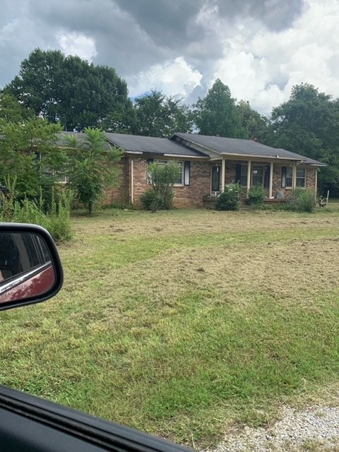 2904 Halls Hill Pike Murfreesboro, TN 37130 - Photo 1 of 1 a front view of a house with garden