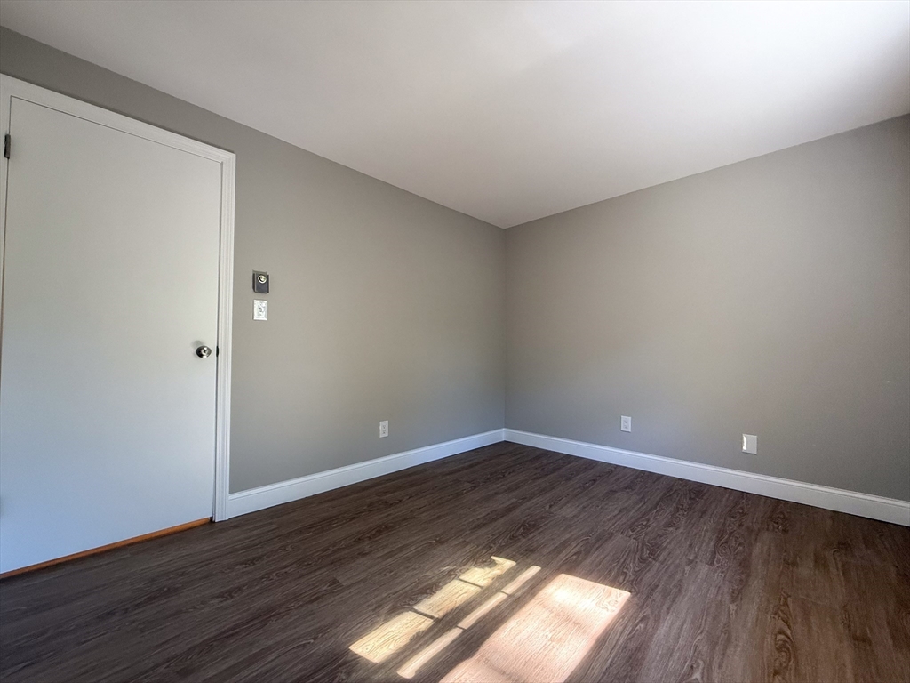 96 Richardson Road, Unit A22 Chelmsford, MA 01863 - Photo 15 of 22 a view of room with wooden floor and natural light