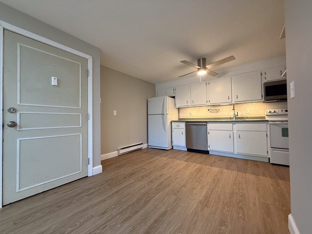 96 Richardson Road, Unit A22 Chelmsford, MA 01863 - Photo 7 of 22 a view of kitchen with sink and microwave area