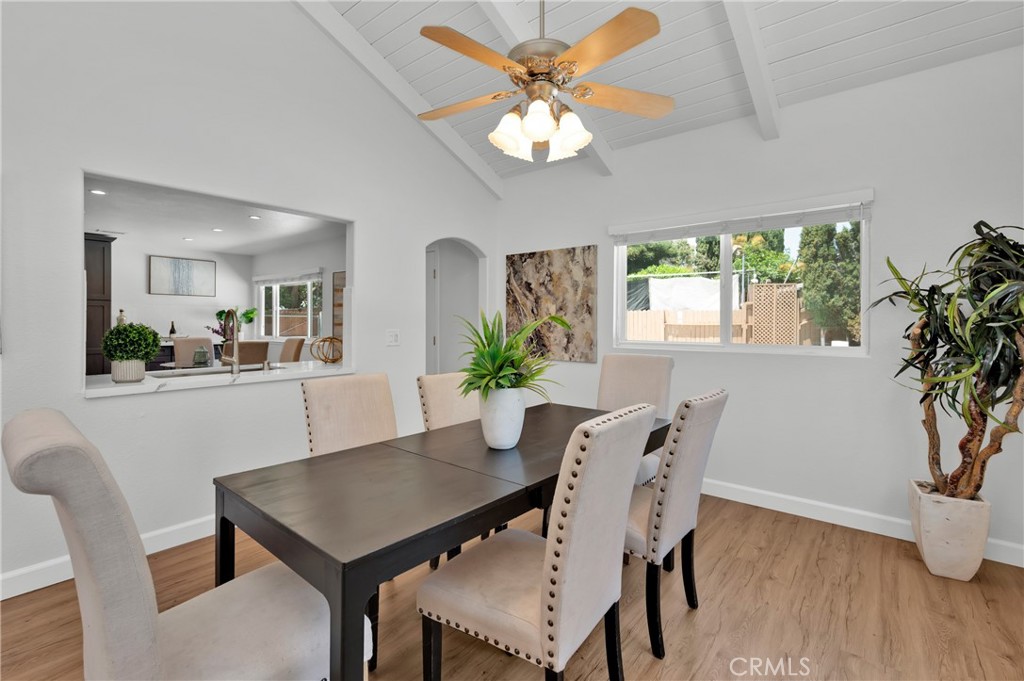 4829 East Kenyon Place Orange, CA 92869 - Photo 17 of 42 a view of a dining room with furniture window and wooden floor