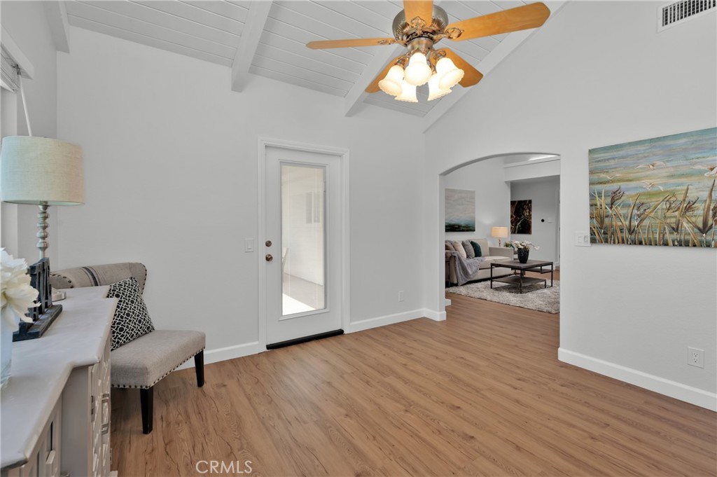 4829 East Kenyon Place Orange, CA 92869 - Photo 18 of 42 a view of a livingroom with furniture and a workspace