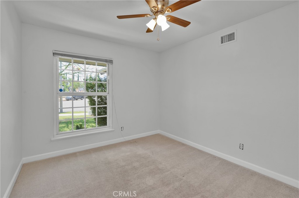 4829 East Kenyon Place Orange, CA 92869 - Photo 24 of 42 an empty room with a window
