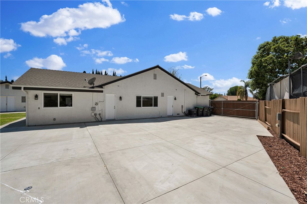 4829 East Kenyon Place Orange, CA 92869 - Photo 39 of 42 a view of house with backyard