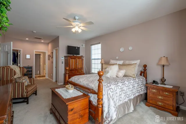 a bedroom with a bed and furniture