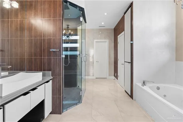 a bathroom with a bathtub and a sink