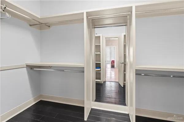 a view of an empty walk in closet