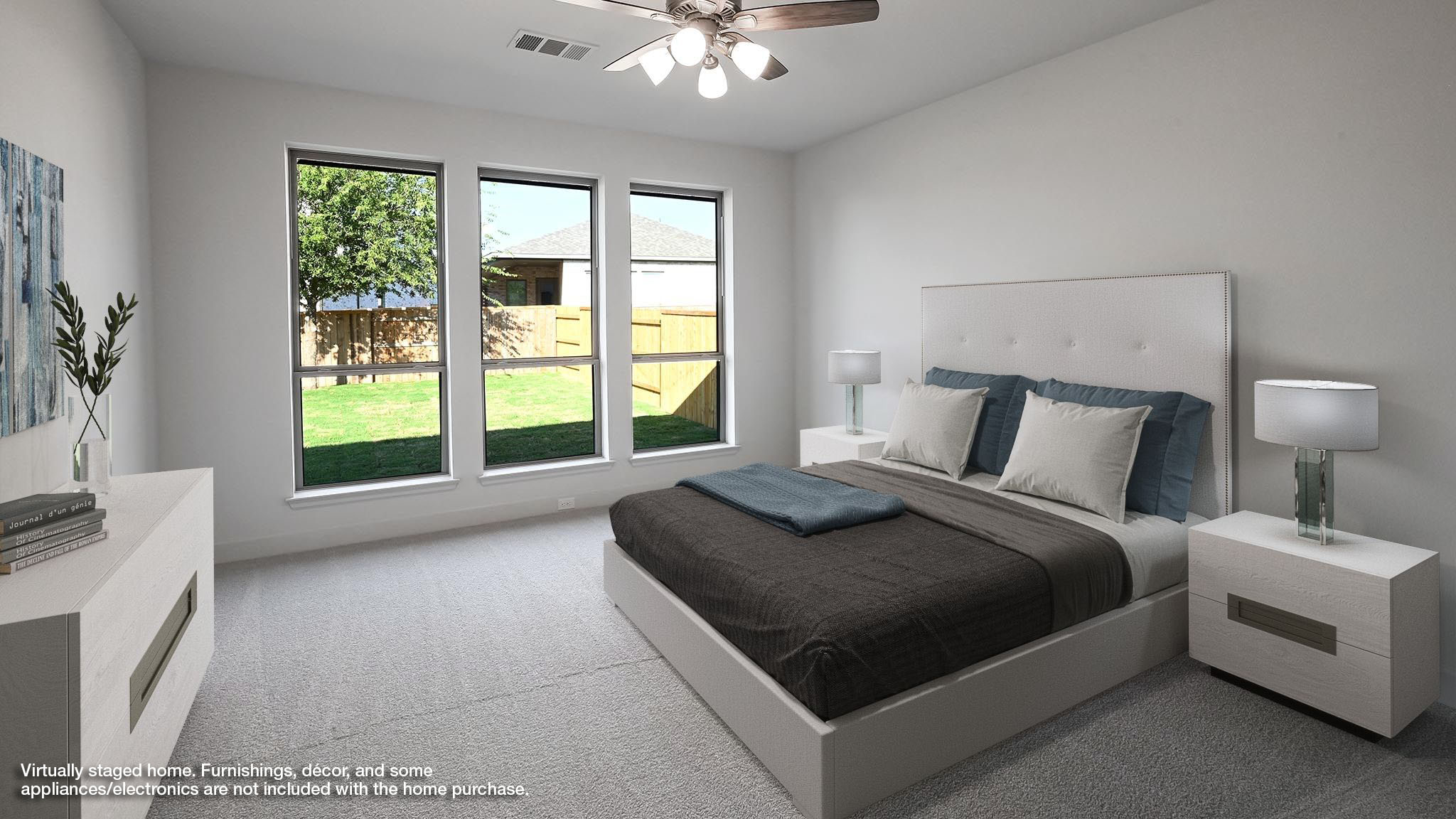 523 Prickly Poppy Loop Kyle, TX 78640 - Photo 6 of 40 a bedroom with a large bed and a large window