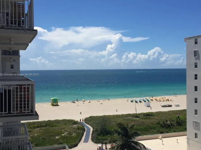a view of swimming pool from a balcony