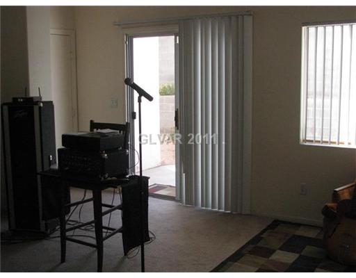 5965 Crumbling Ridge Street Henderson, NV 89011 - Photo 11 of 25 Living Room.