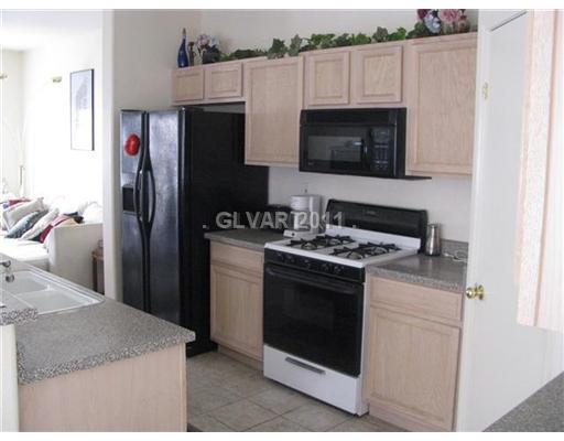 5965 Crumbling Ridge Street Henderson, NV 89011 - Photo 5 of 25 Kitchen.