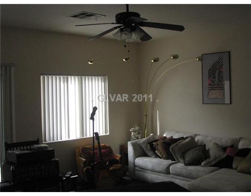 5965 Crumbling Ridge Street Henderson, NV 89011 - Photo 9 of 25 Living Room.