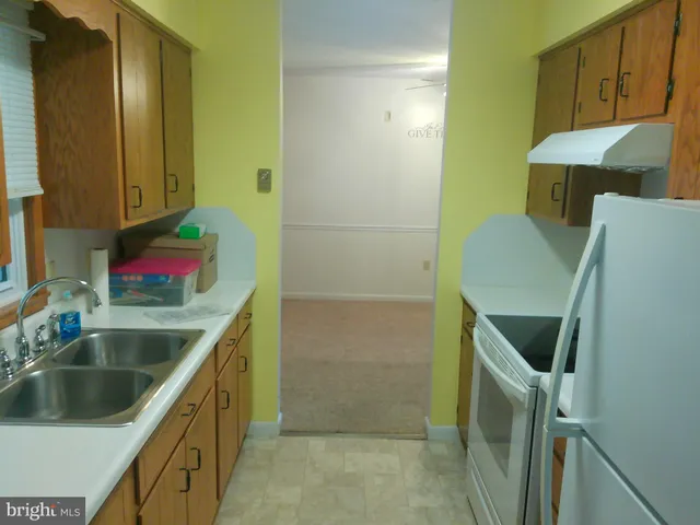 a bathroom with a sink and toilet